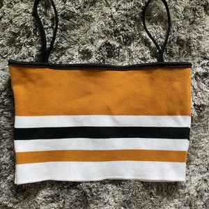 Cute gold white and black crop top!